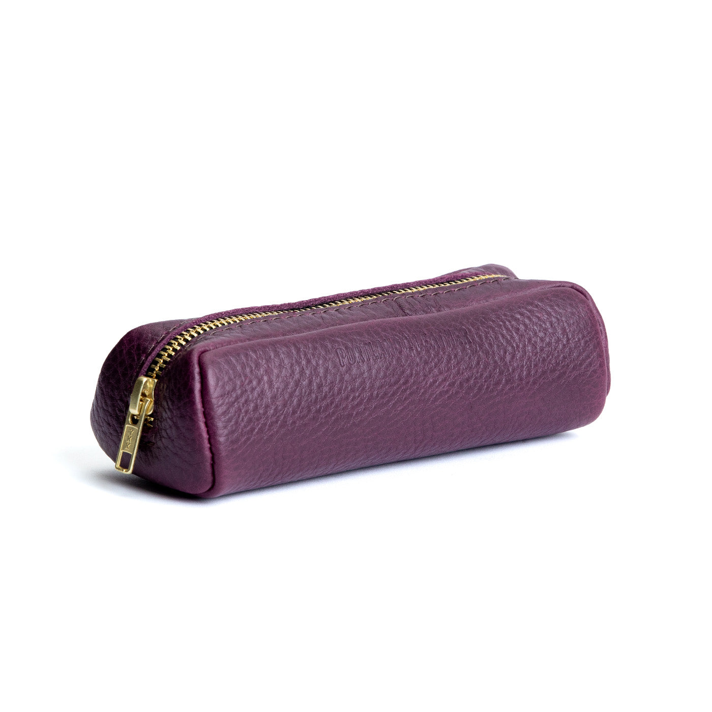 All Color: Plum | Leather pouch with a curved top and zipper