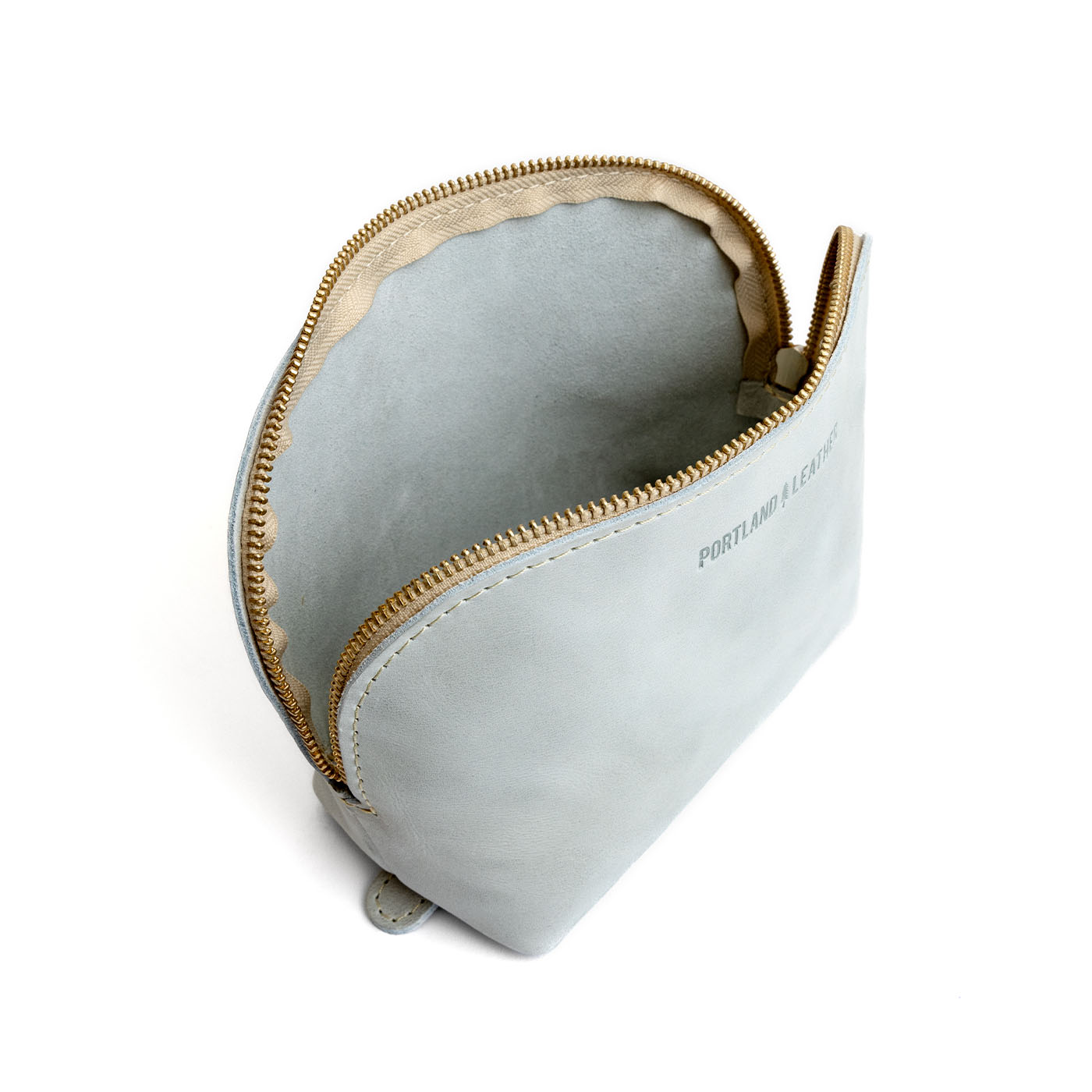 Beluga*Belladonna | Leather makeup bag with curved top zipper and flat bottom