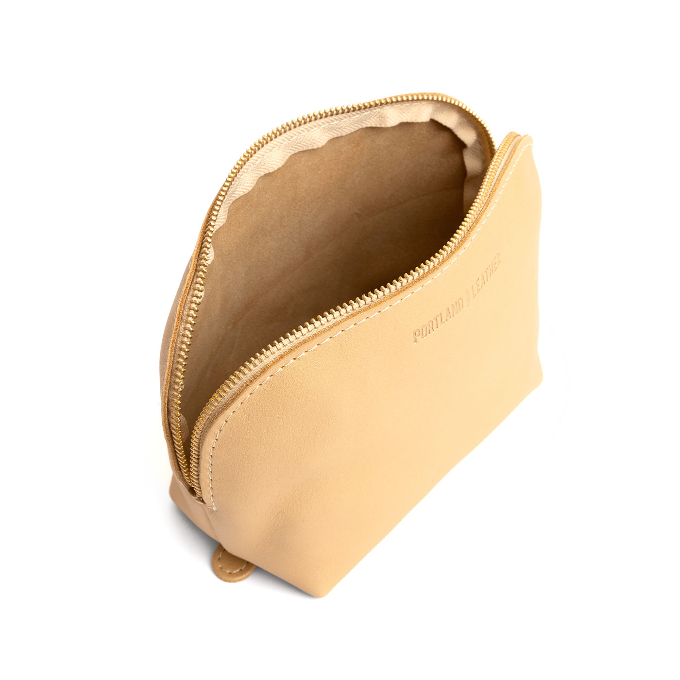 Champagne*Belladonna | Leather makeup bag with curved top zipper and flat bottom