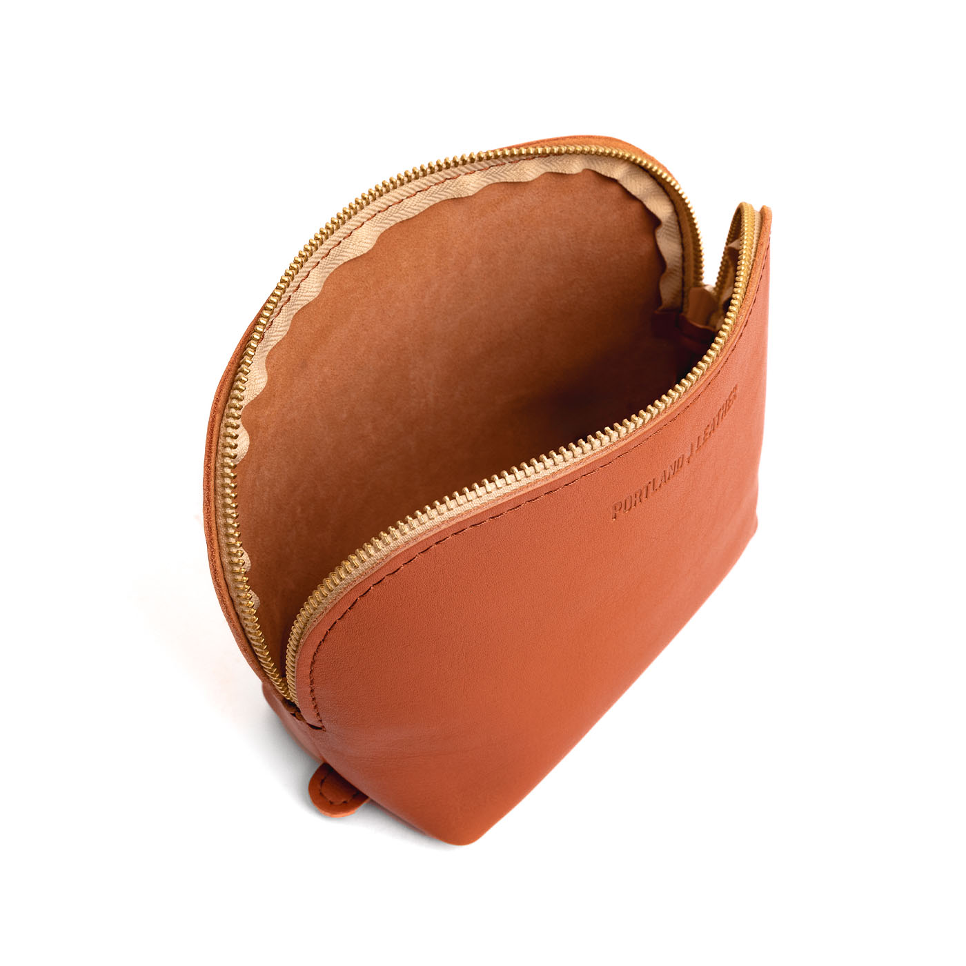 Persimmon*Belladonna | Leather makeup bag with curved top zipper and flat bottom