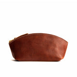 Nutmeg Eclipse | Spacious leather makeup bag with curved seams and top zipper