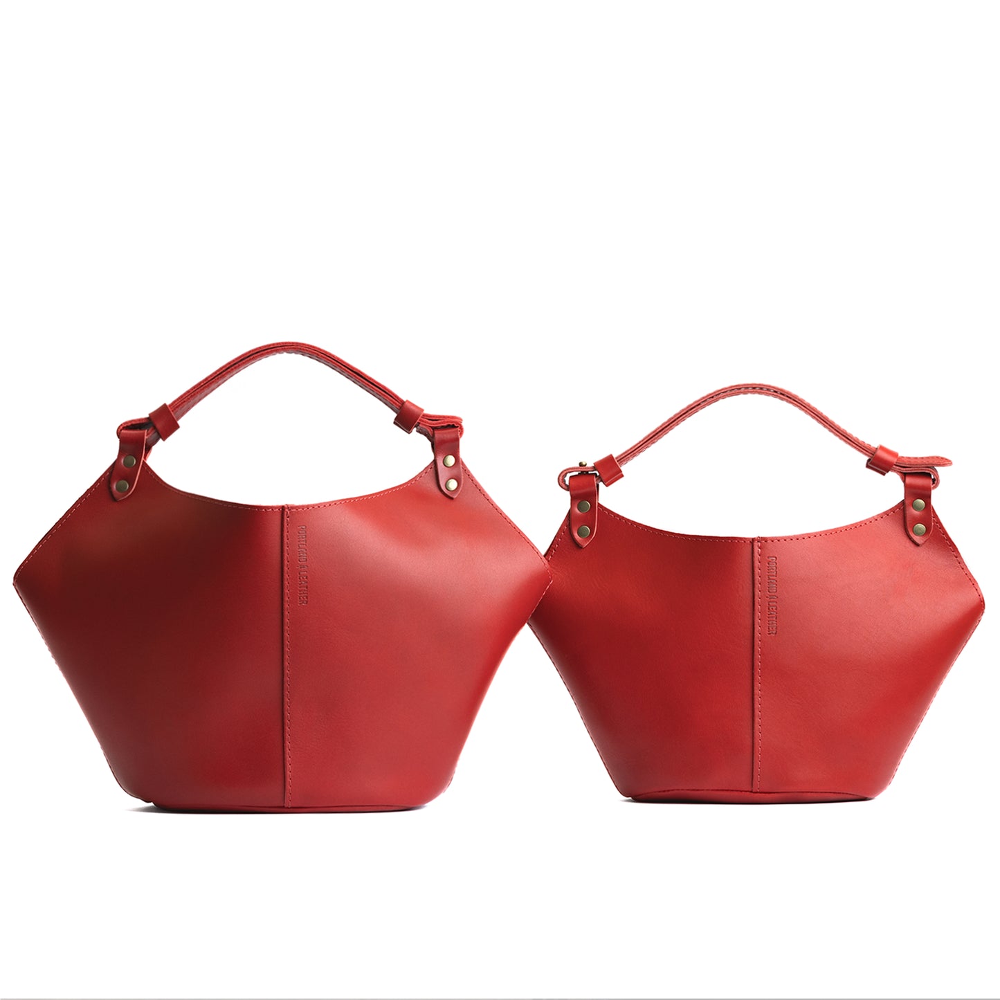 Ruby | Structured bucket shaped handbag with an adjustable shoulder strap