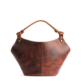 Lava Small | Structured bucket shaped handbag with an adjustable shoulder strap