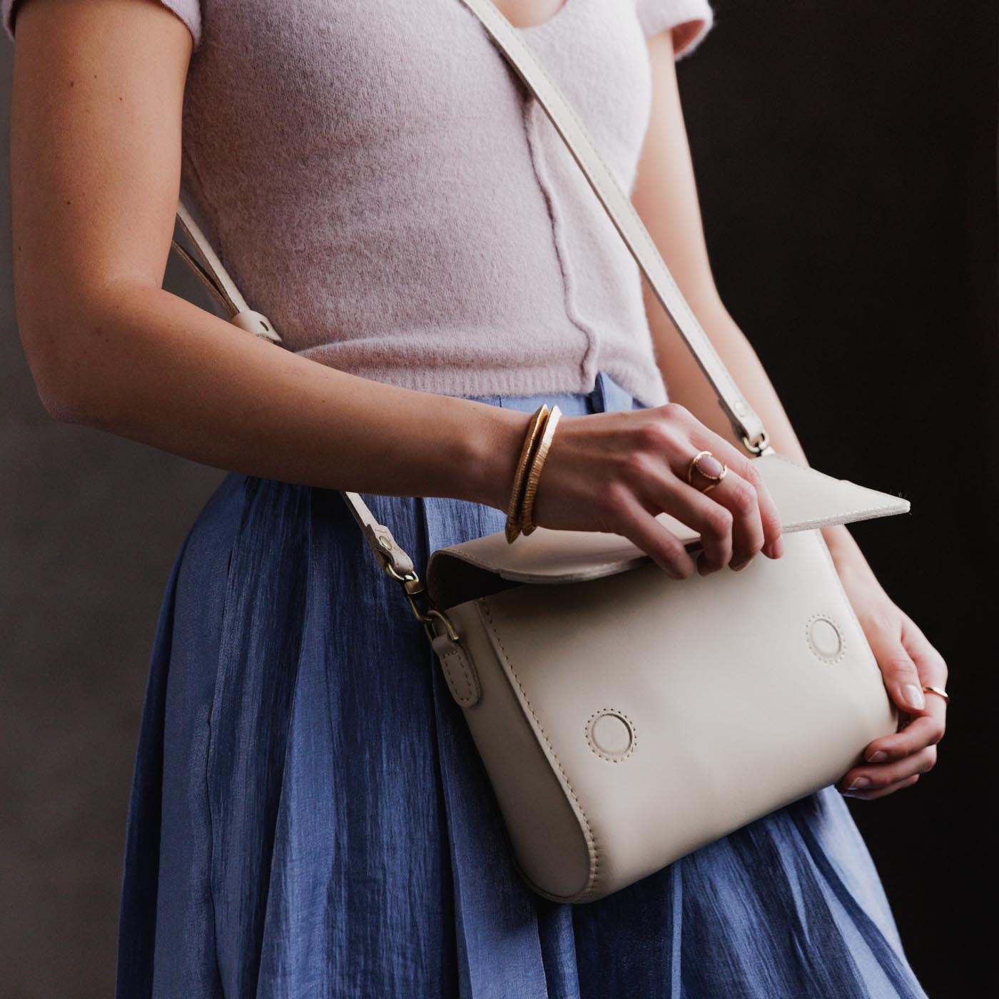 Bone*Medium | Model Wearing Leather Crossbody Bag with Magnetic Messenger Bag Closure