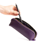 Empire | Leather pouch with curved seams and top zipper