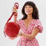 Ruby Small | Circle shaped crossbody bag with top zipper