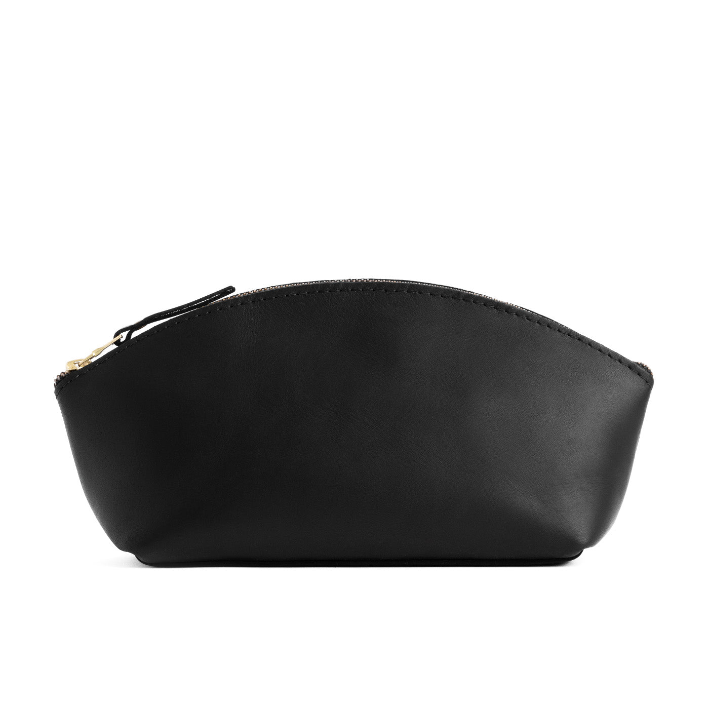 Black*Total Eclipse | Spacious leather makeup bag with curved seams and top zipper