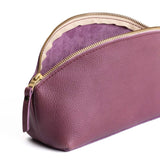 Kyoto | Spacious leather makeup bag with curved seams and top zipper