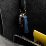 Deep Water Small | slim leather tassel with brass ring