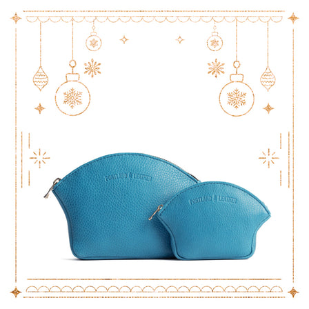 Baja*Small | Seashell shaped leather makeup bag with curved top zipper and flat bottom