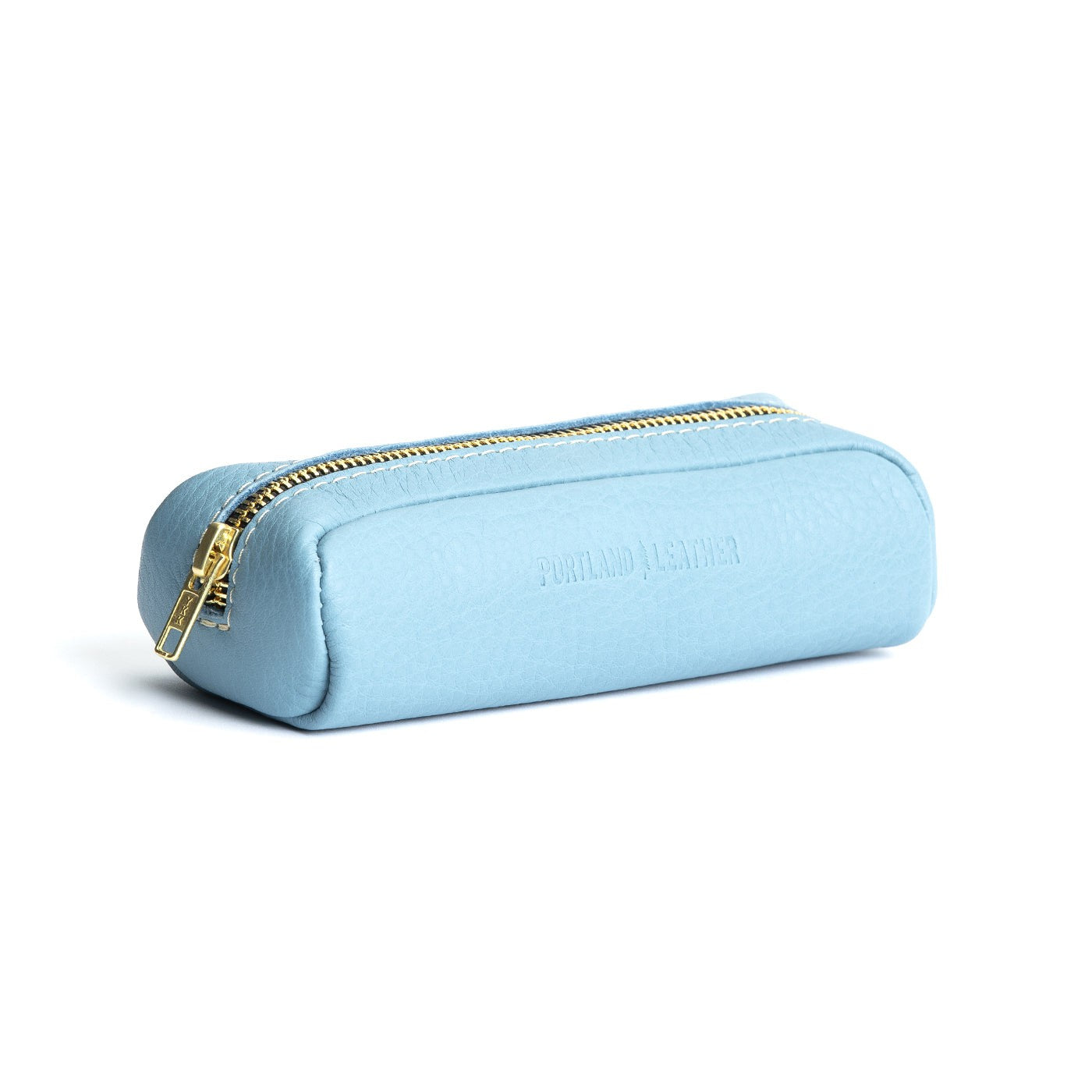 All Color: Dream | Leather pouch with a curved top and zipper