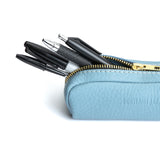 All Color: Dream | Leather pouch with a curved top and zipper