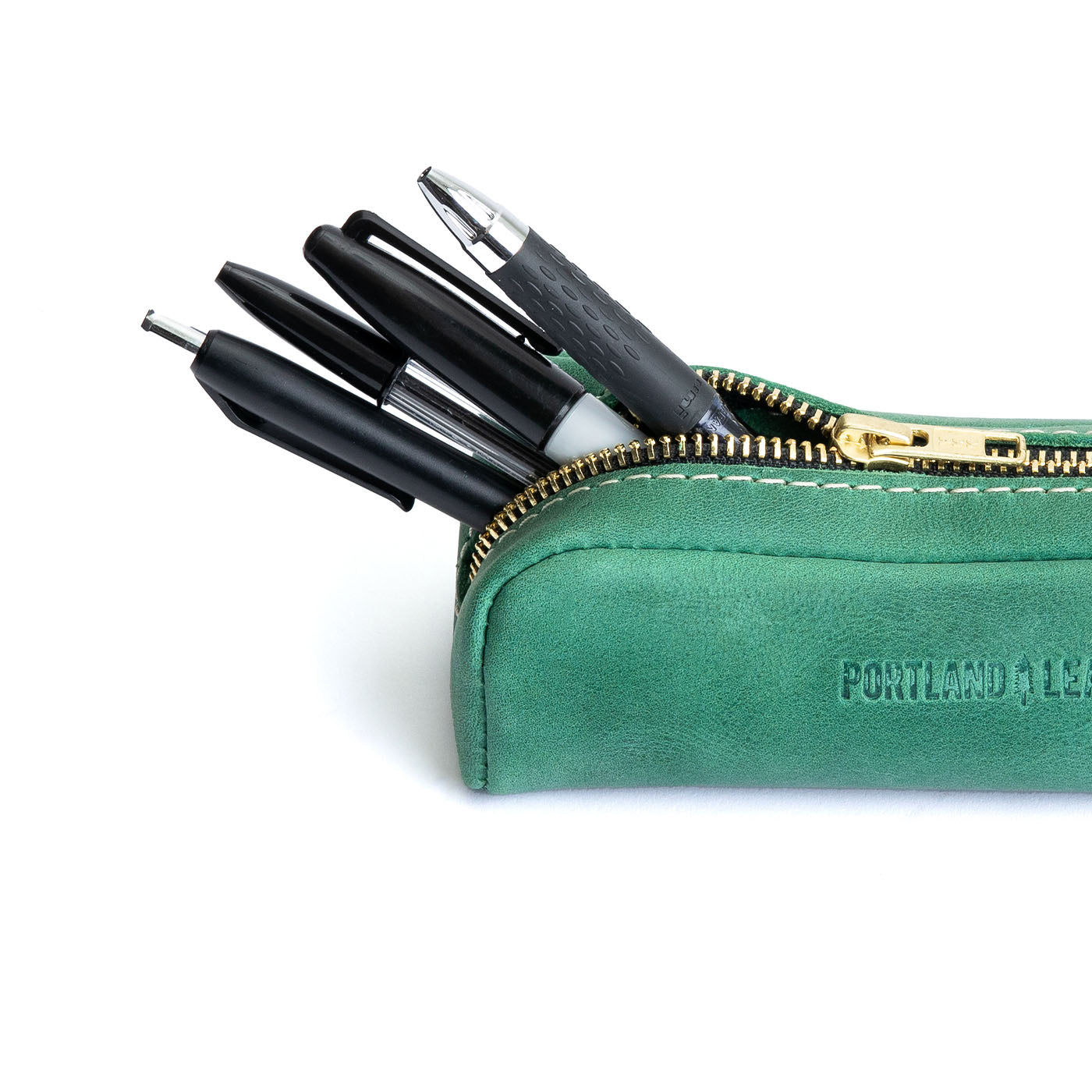 All Color: Surf | Leather pouch with a curved top and zipper