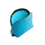 Baja Bella | Leather makeup bag with curved top zipper and flat bottom