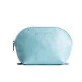 Cabo Bella | Leather makeup bag with curved top zipper and flat bottom