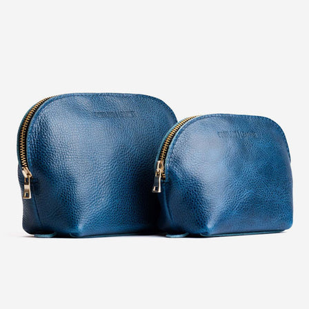 Caspian*Belladonna | Leather makeup bag with curved top zipper and flat bottom