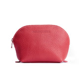 Sugar Bella | Leather makeup bag with curved top zipper and flat bottom