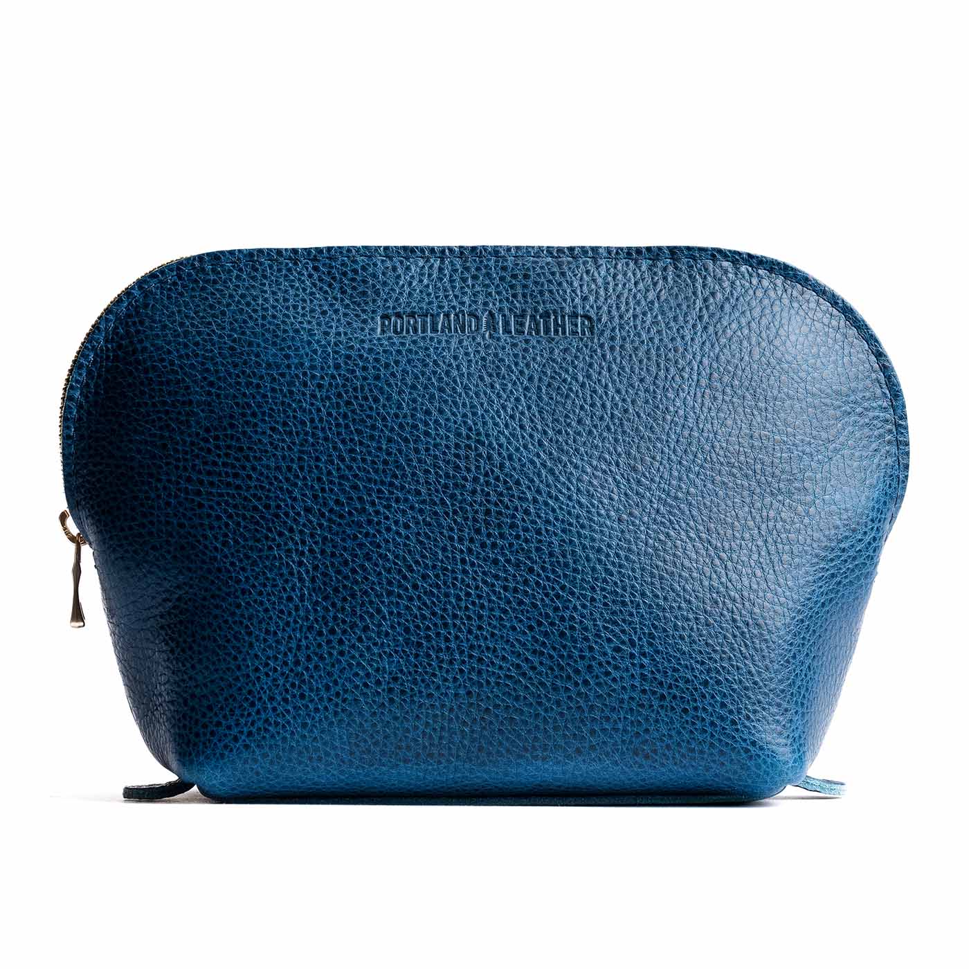 Caspian*Belladonna | Leather makeup bag with curved top zipper and flat bottom