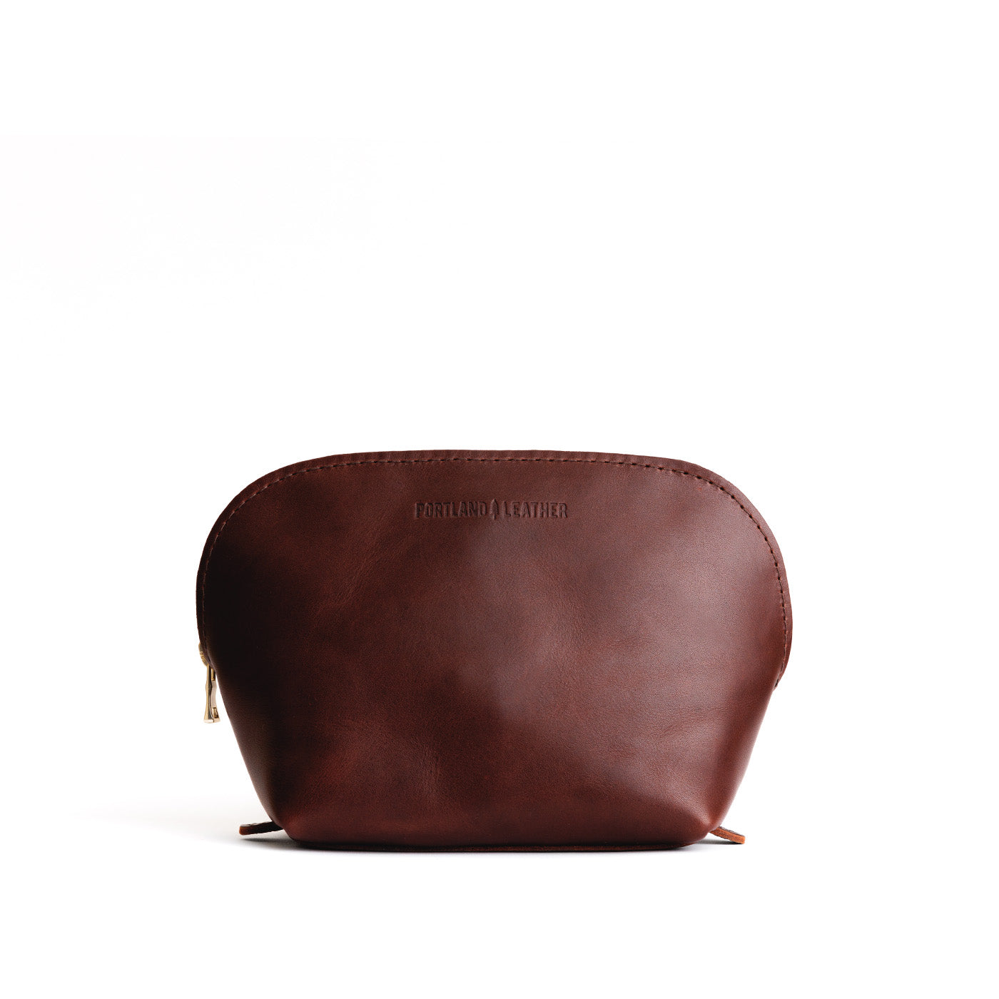 Cognac*Belladonna | Leather makeup bag with curved top zipper and flat bottom