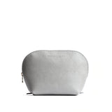 Nimbus Belladonna | Leather makeup bag with curved top zipper and flat bottom