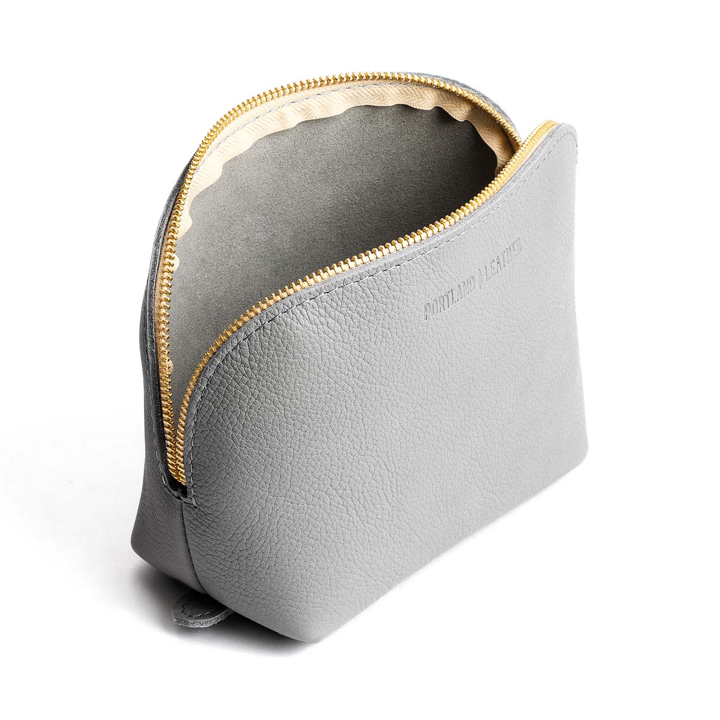 Nimbus*Belladonna | Leather makeup bag with curved top zipper and flat bottom