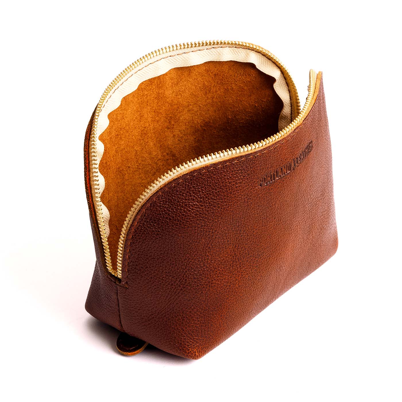 Nutmeg*Belladonna | Leather makeup bag with curved top zipper and flat bottom