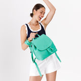 West Palm | Model holding slouchy leather bucket backpack