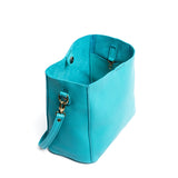 Key West | symmetrical bucket bag with latch closure and removable crossbody strap