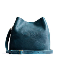 Lagoon | symmetrical bucket bag with latch closure and removable crossbody strap