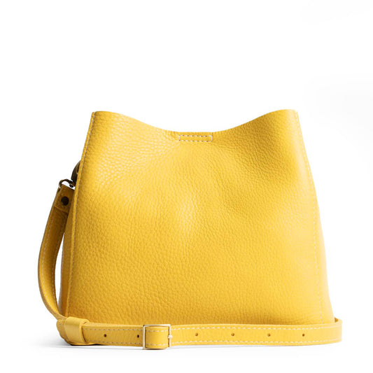 Naples | symmetrical bucket bag with latch closure and removable crossbody strap