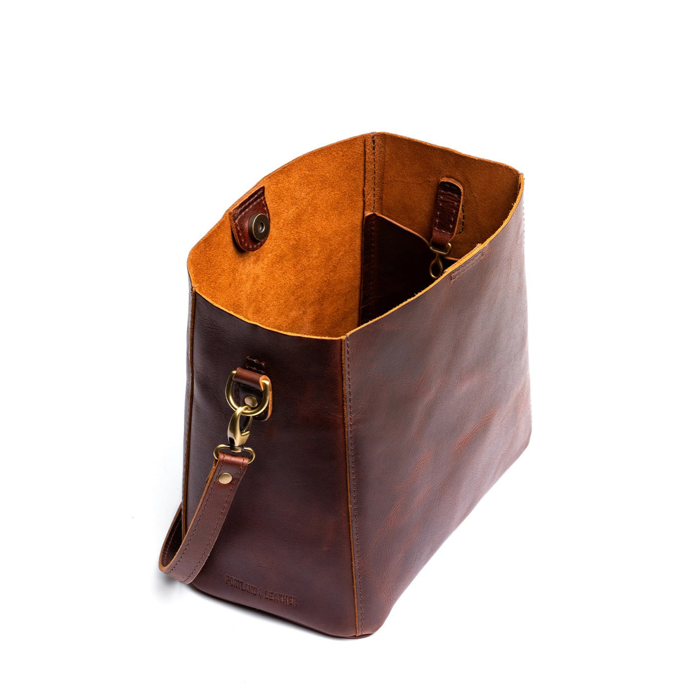 Timber | symmetrical bucket bag with latch closure and removable crossbody strap