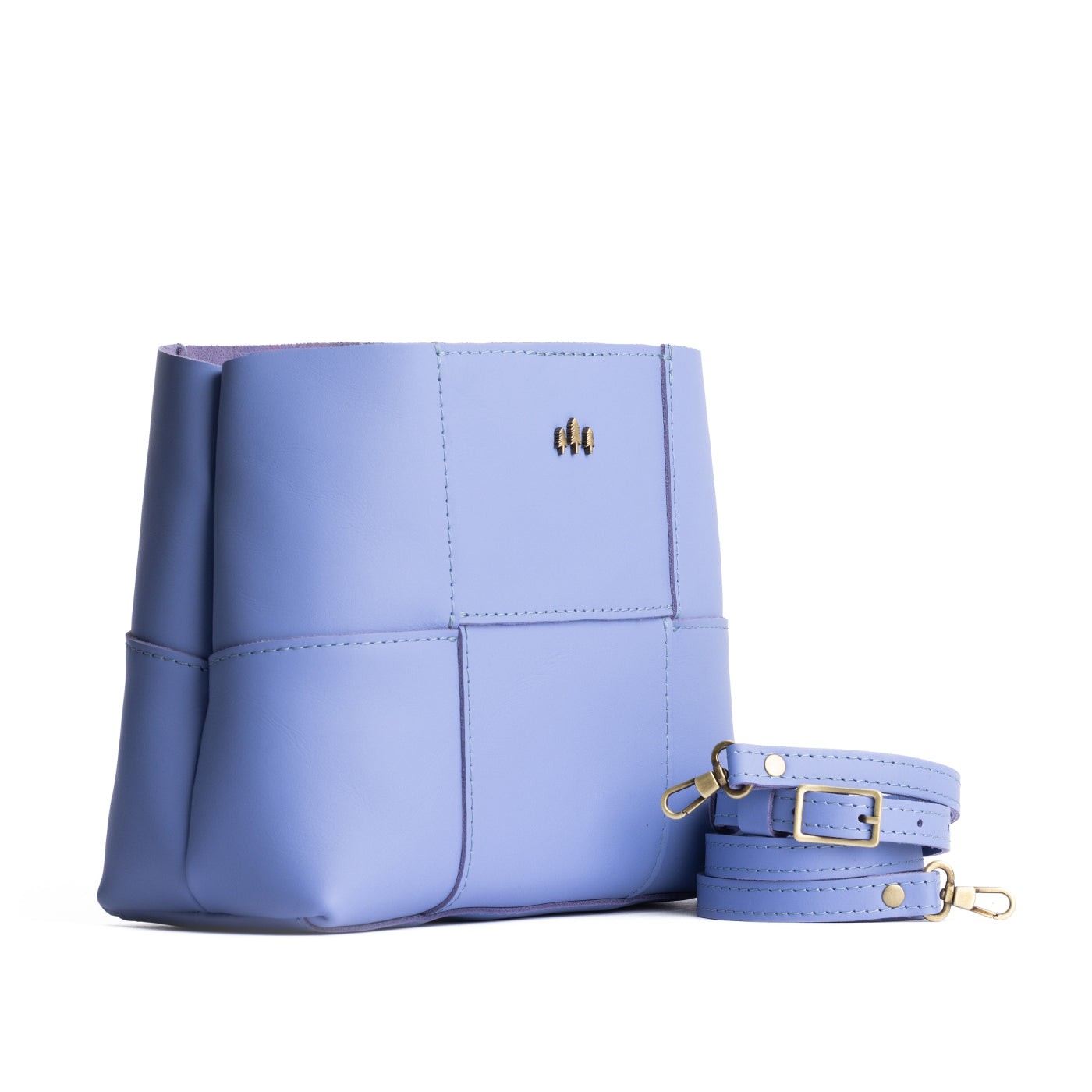 Jacaranda*Large | Structured woven leather bag with three metal tree emblems and crossbody strap