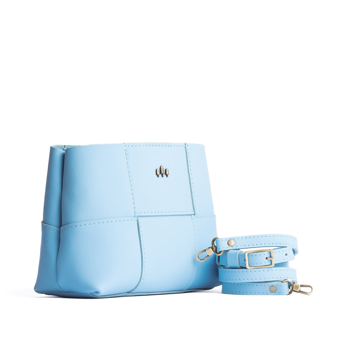 Glacial Blue*Small | Structured woven leather bag with three metal tree emblems and crossbody strap