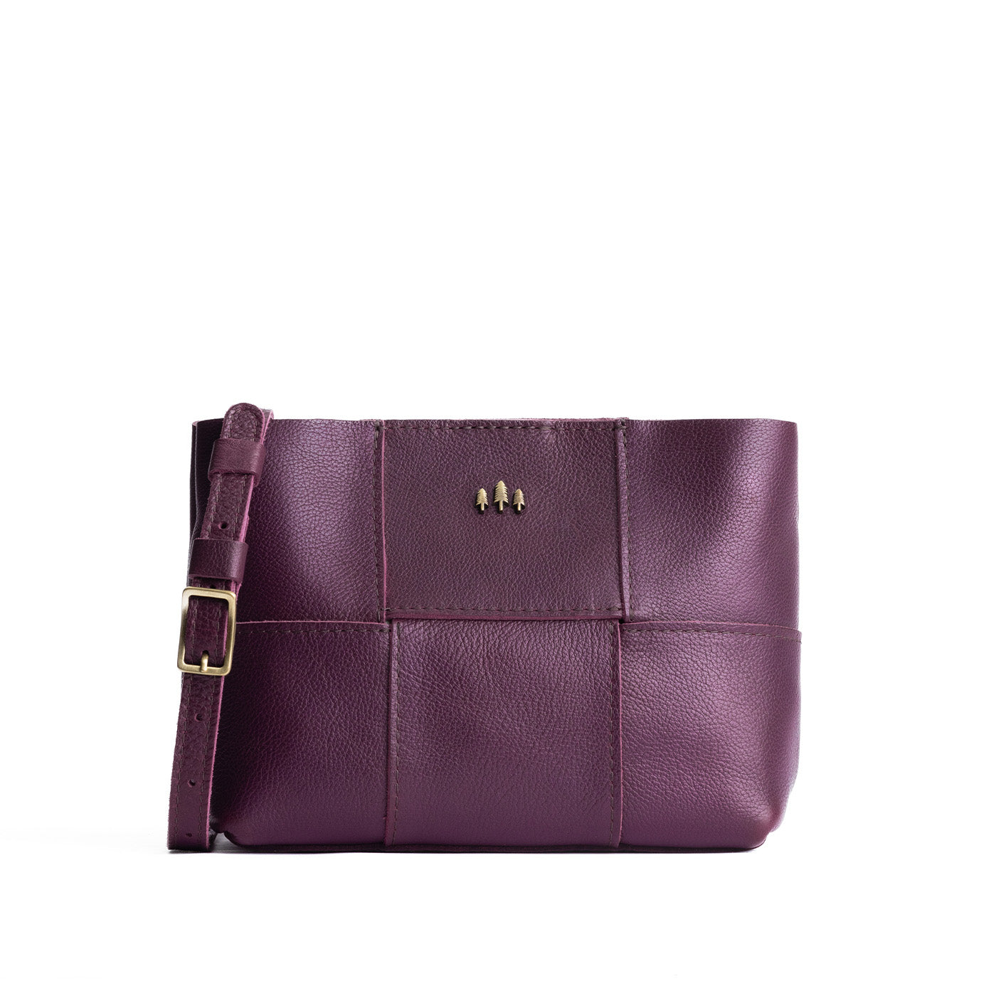 Plum*Small | Structured woven leather bag with three metal tree emblems and crossbody strap