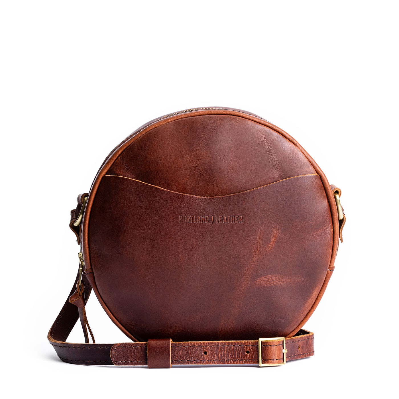 Timber*Large | Circle shaped crossbody with exterior pocket and top zipper