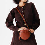 Chestnut Small | Circle shaped crossbody bag with top zipper