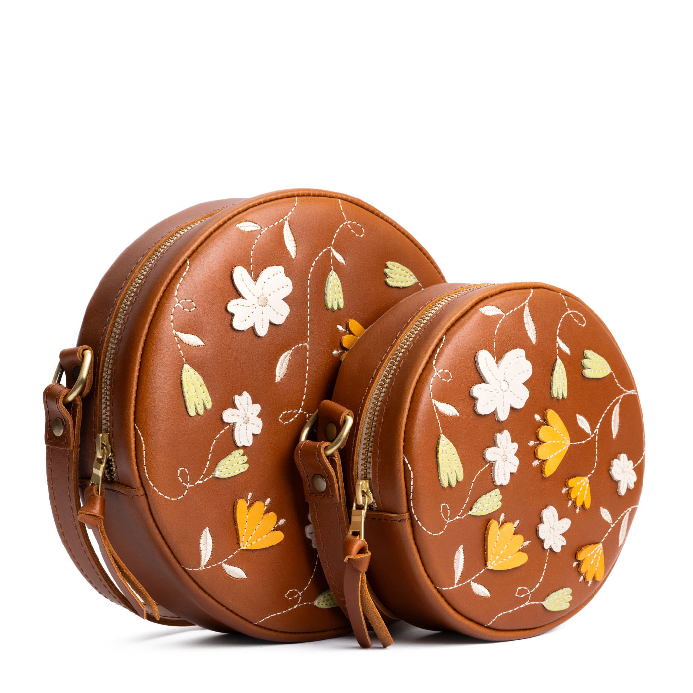 Folklore Honey | Circle shaped crossbody bag with embroidered flower design