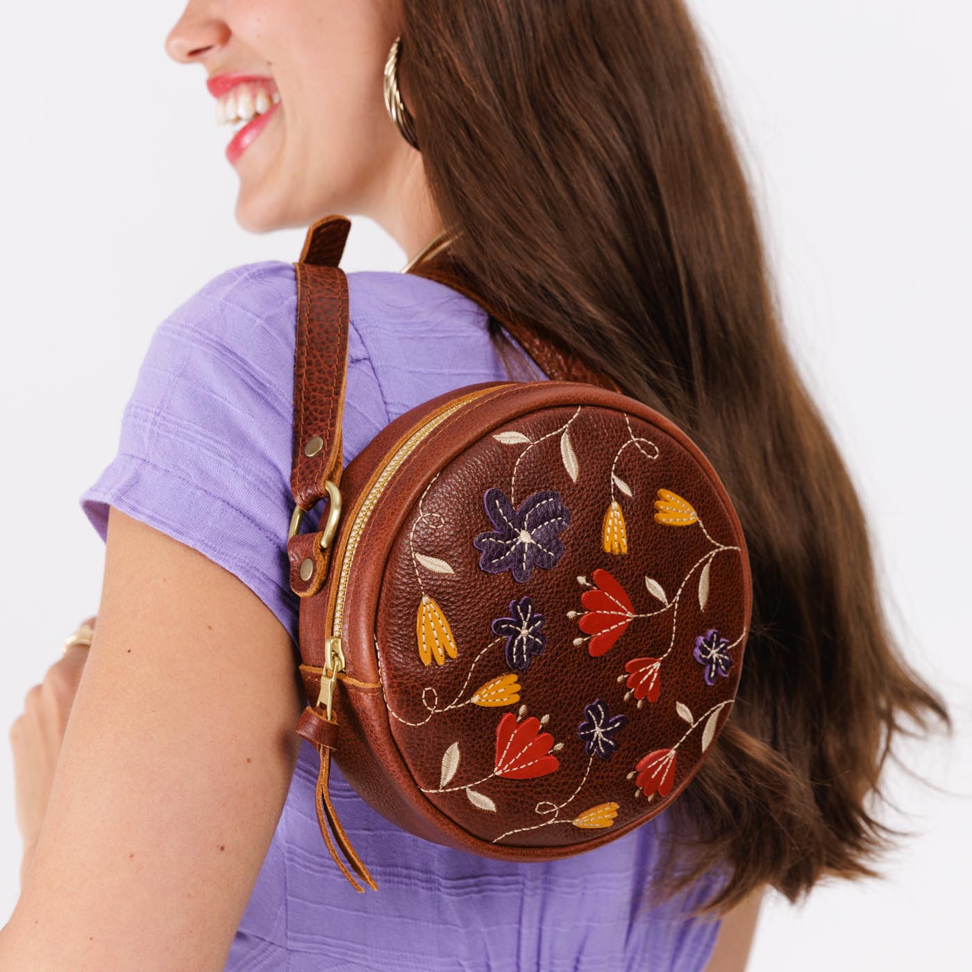 Folklore Nutmeg*Small | Circle shaped crossbody bag with embroidered flower design