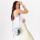 Wildflower Glacial Blue Small | Circle shaped crossbody bag with embroidered flower design