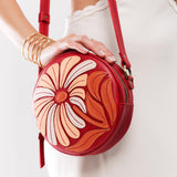 Wildflower Ruby Small | Circle shaped crossbody bag with embroidered flower design