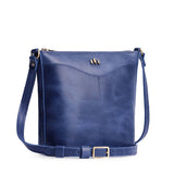 Cowboy Blue | Rectangular side bag with curved front pocket and metal tree shaped badge