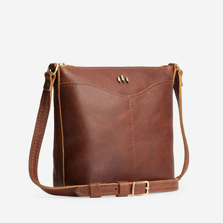 Nutmeg | Rectangular side bag with curved front pocket and metal tree shaped badge