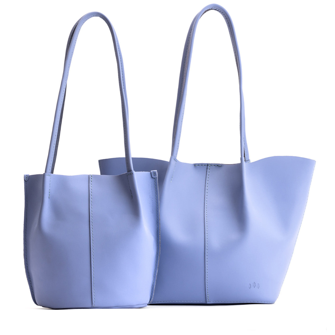 Jacaranda | Size comparison of classic and large bucket shaped tote bags with matching leather handles