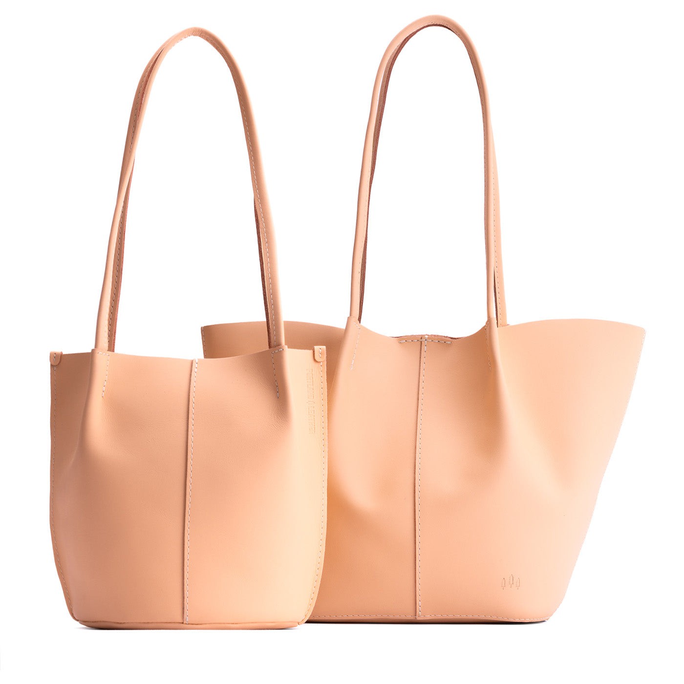 Mamey | Size comparison of classic and large bucket shaped tote bags with matching leather handles