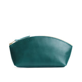 Caribbean Eclipse | Spacious leather makeup bag with curved seams and top zipper