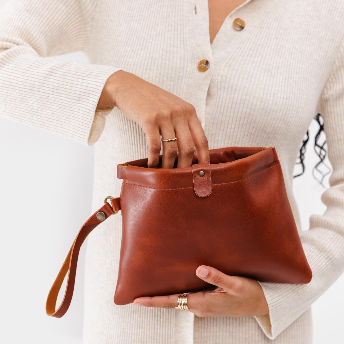 Chestnut | Model holding rectangular clutch with removable wristlet