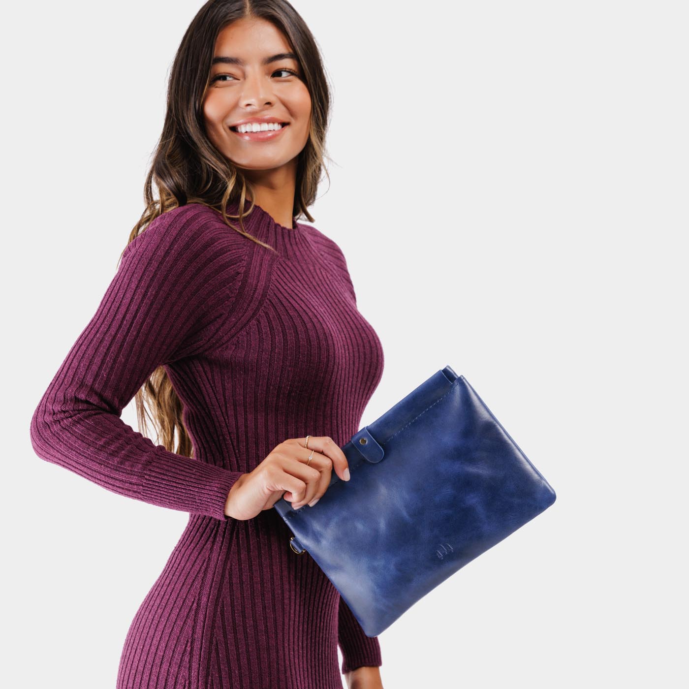 Cowboy Blue | Model holding rectangular clutch with removable wristlet