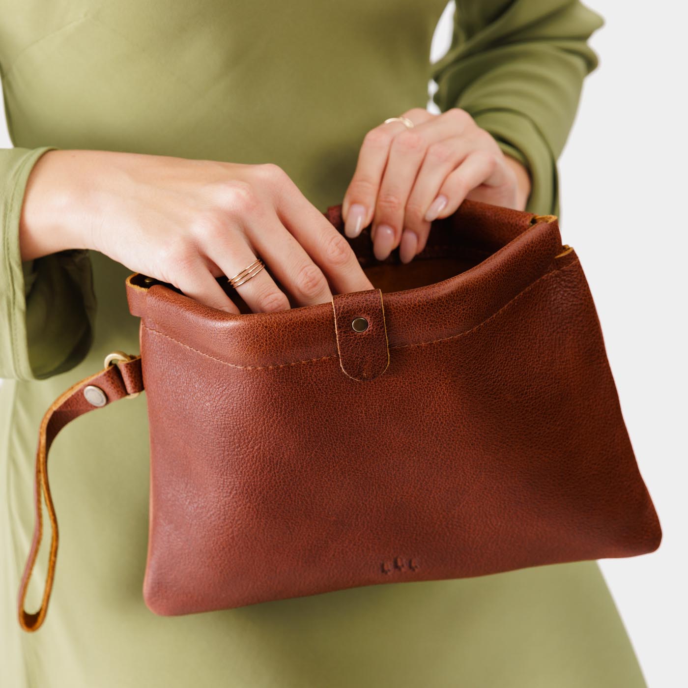 Nutmeg | Model holding rectangular clutch with removable wristlet