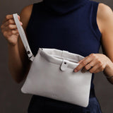 Pearl | Model holding rectangular clutch with removable wristlet