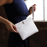 Pearl | Model holding rectangular clutch with removable wristlet